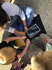 Students working with solar panels